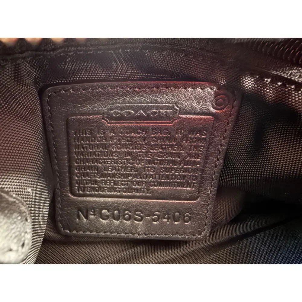 Coach black leather toiletry bag